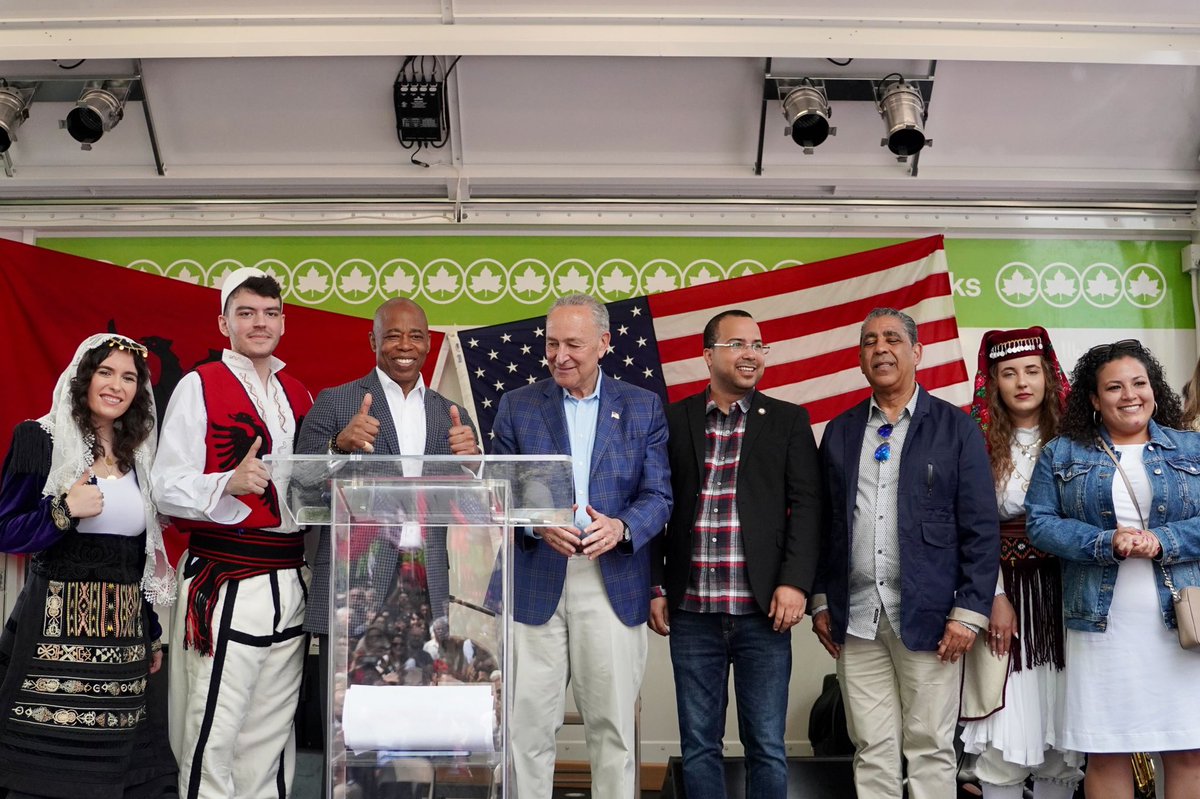 Mayor Adams poses on stage with Albanian community leaders, Senator Schumer, Council Member Feliz and Congressman Espaillat