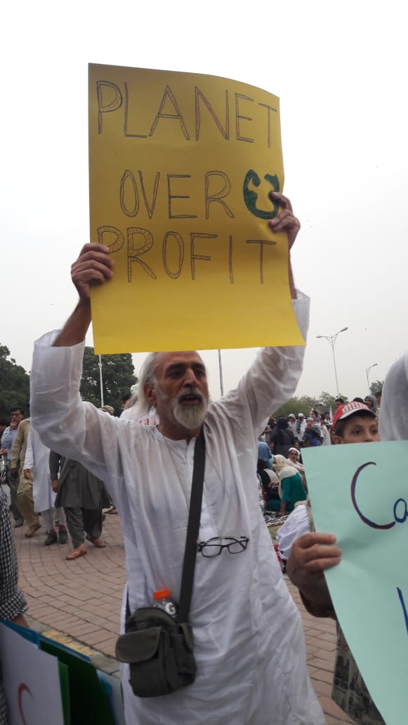 AWPIsbRwp's tweet photo. (WDF), the protest centred the theme ‘System Change, not Climate Change’ so as to highlight how the existing capitalist economic system is based on unbridled profiteering and unsustainable consumption that are destroying eco-systems across Pakistan. 
#ClimateActionPakistan https://t.co/0eLoglYAig