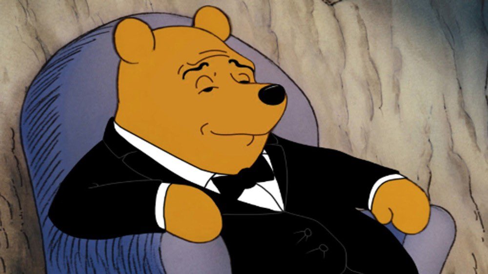 "Fancy Pooh" meme featuring Winnie the Pooh in a black bow tie an...