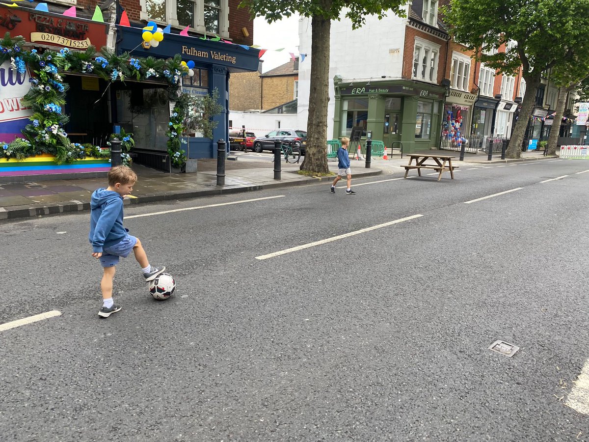 BeebsG's tweet photo. Today was quite a special day, my children played football, for the first time ever, on the road they have grown up on, the A217, Wandsworth Bridge Road. The first ever road closure for the people of Fulham. #wbrSpringFayre @WbrAssociation https://t.co/dc9bNE6Jyt