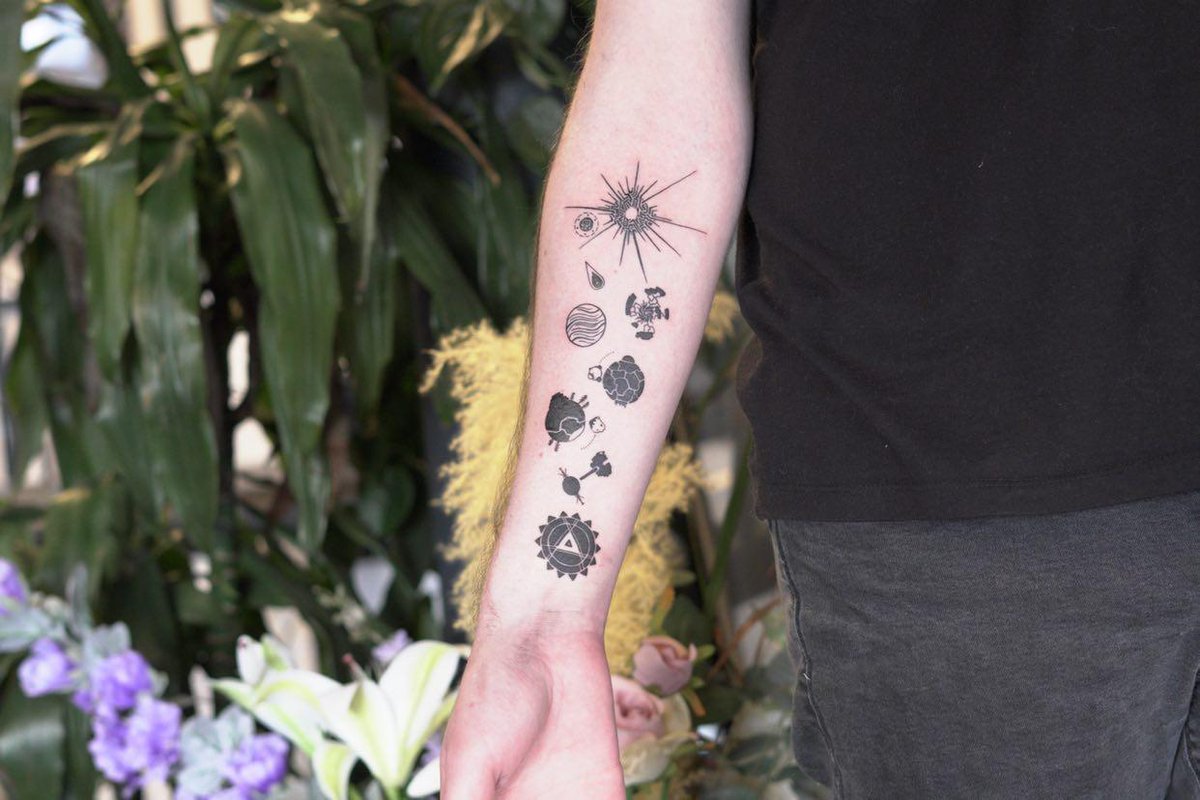 RhysNathan's tweet photo. new tattoo based on Outer Wilds https://t.co/JvuAusHw3C