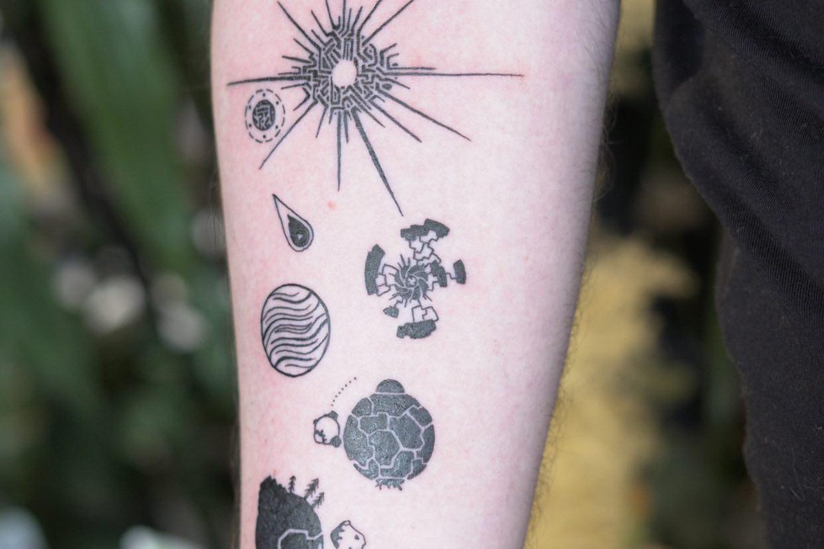 RhysNathan's tweet photo. new tattoo based on Outer Wilds https://t.co/JvuAusHw3C