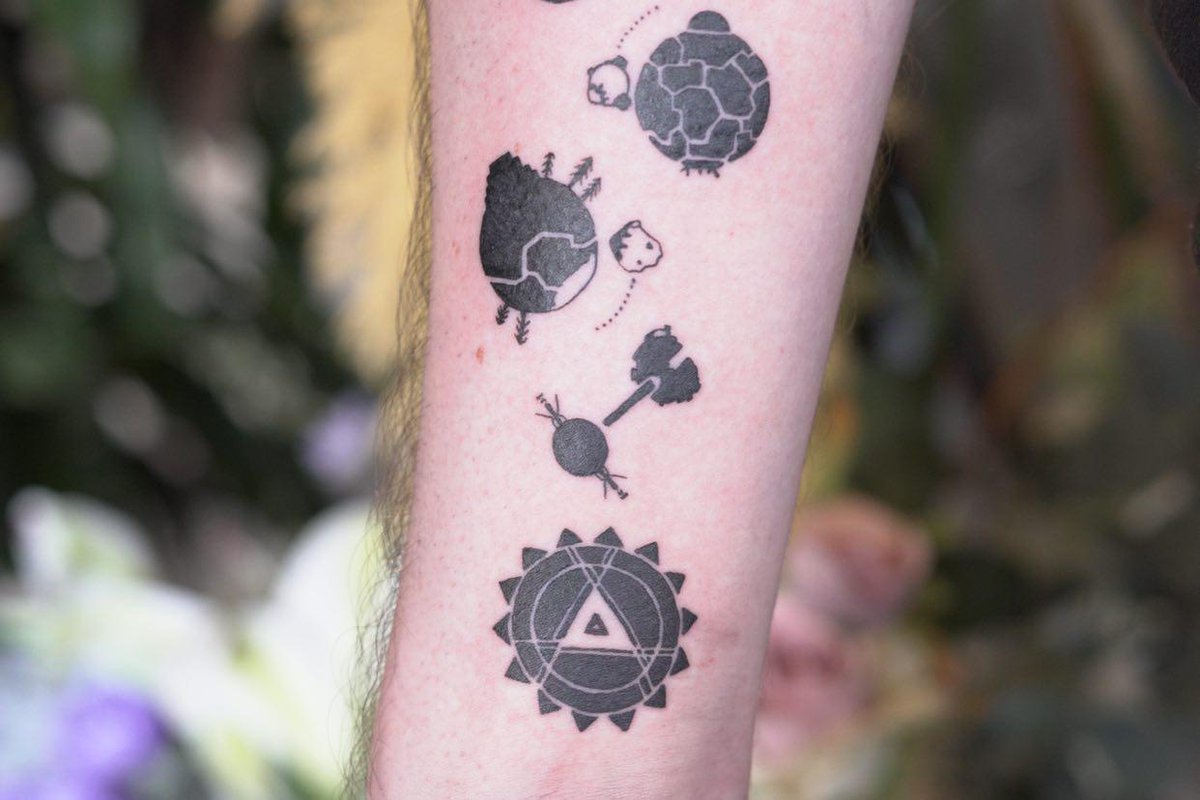 RhysNathan's tweet photo. new tattoo based on Outer Wilds https://t.co/JvuAusHw3C