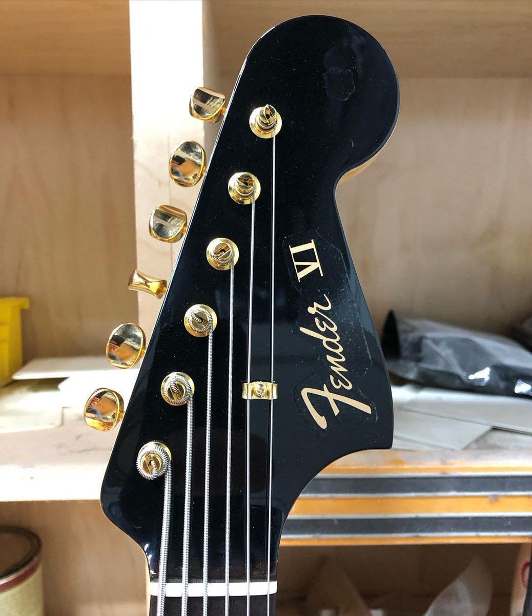 Fender's tweet photo. We're loving this ‘63 Black Bass VI with gold hardware from the bench of Vince Van Trigt. https://t.co/LDZ5a9q6mn
