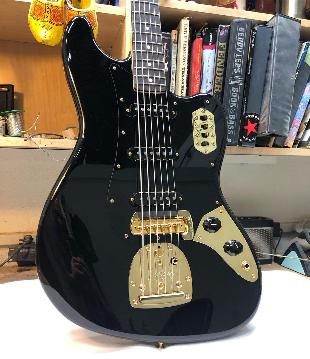 Fender's tweet photo. We're loving this ‘63 Black Bass VI with gold hardware from the bench of Vince Van Trigt. https://t.co/LDZ5a9q6mn