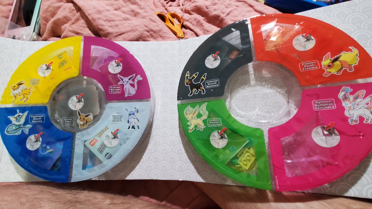 New eeveelution confirmed! The middle of the right circle is covered in plastic but also perforated like the rest. This is LEGO future proofing so they can easily re-release this set after the new form is revealed.