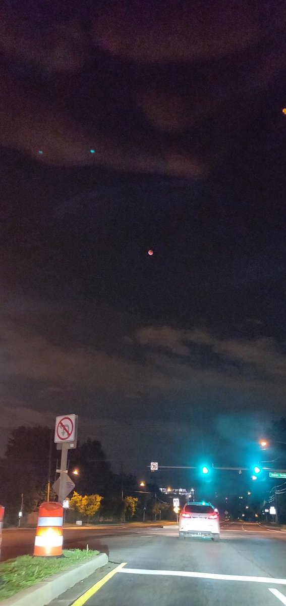 lunascientist's tweet photo. Finally! Witnessed my first lunar eclipse..on the way back from #NASAScienceLive with @_JoyNg and @Ryan_N_Watkins. Couldn't have been at a better time! I'm in awe rn ❤️

#lunareclipse2022 #NASA https://t.co/XcZEXPYeCU