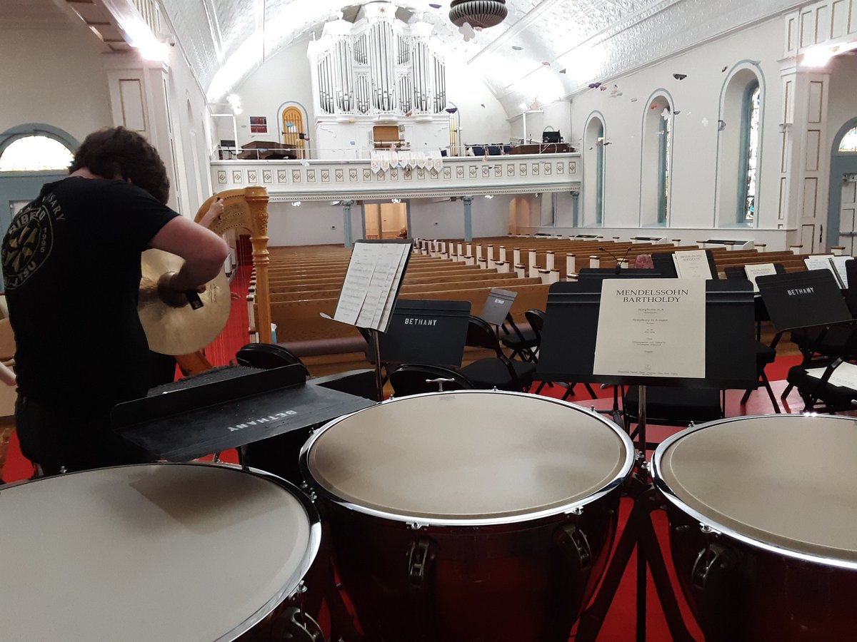 KSTATE_PERC's tweet photo. With student Jacob Morgan and several faculty colleagues, setting up for a chamber orchestra rehearsal in Lindsborg. https://t.co/iEfnxHLYar