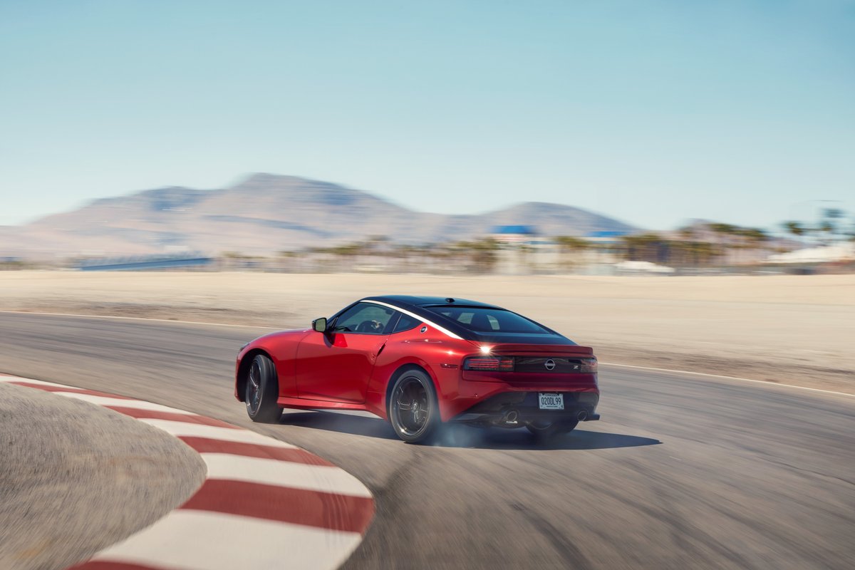 CARandDRIVER's tweet photo. 2023 @Nissan Z First Drive: Z, OMG! https://t.co/3oWuNWCAKr https://t.co/oKKo1MCkii