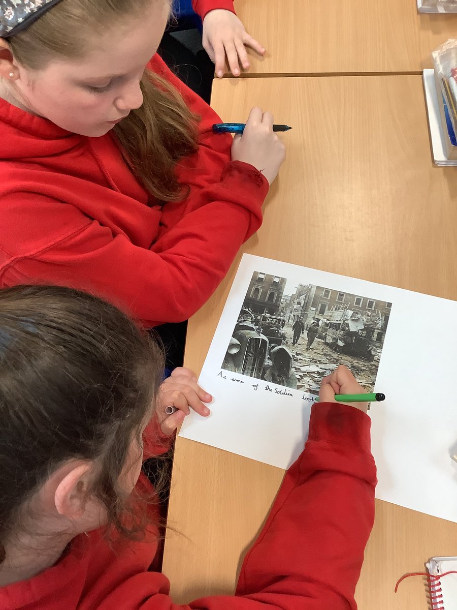 Year6OPS's tweet photo. Some fantastic sharing of ideas in English as we prepare to write our descriptive paragraphs about the Blitz. Using empathy and all our senses we are able to convey the devastation. #English #empathy #contextualised #history https://t.co/i1zDSZkjQd