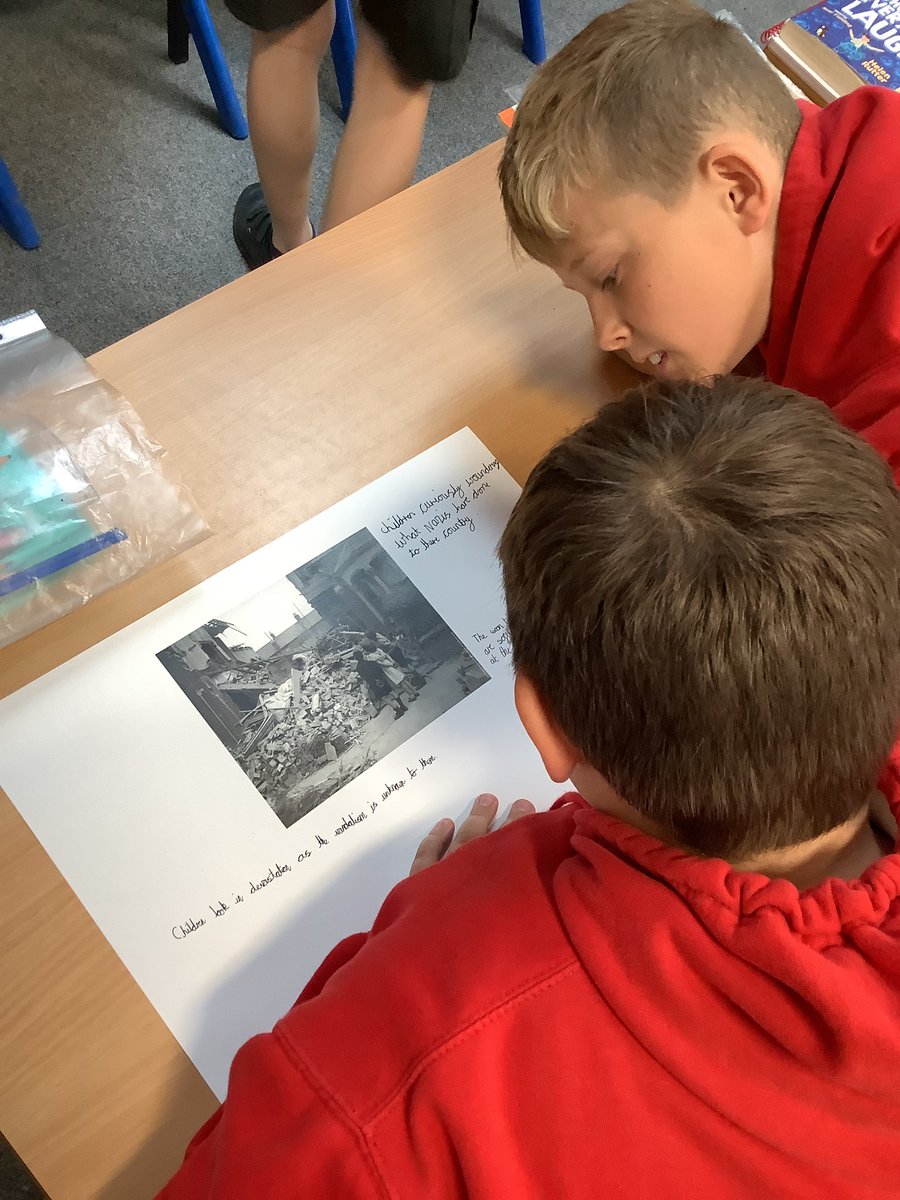 Year6OPS's tweet photo. Some fantastic sharing of ideas in English as we prepare to write our descriptive paragraphs about the Blitz. Using empathy and all our senses we are able to convey the devastation. #English #empathy #contextualised #history https://t.co/i1zDSZkjQd