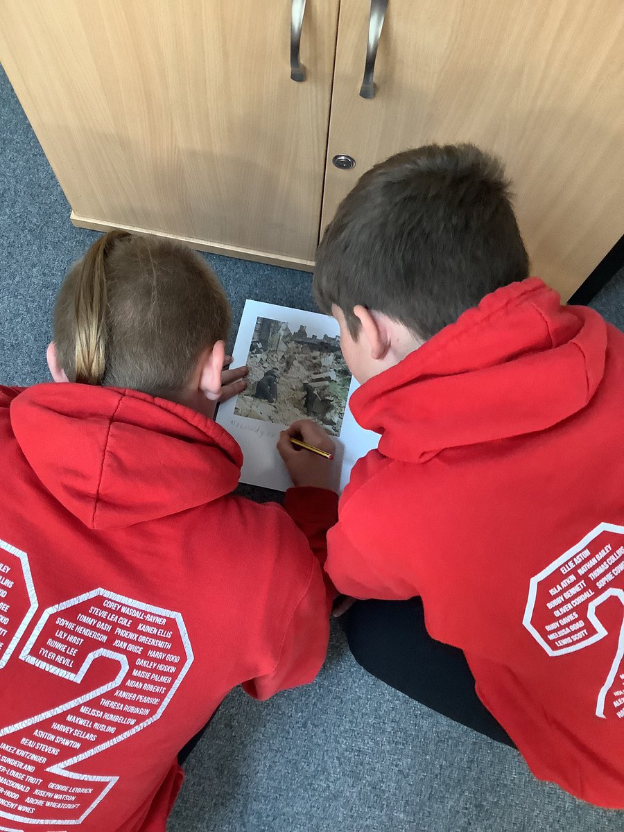 Year6OPS's tweet photo. Some fantastic sharing of ideas in English as we prepare to write our descriptive paragraphs about the Blitz. Using empathy and all our senses we are able to convey the devastation. #English #empathy #contextualised #history https://t.co/i1zDSZkjQd