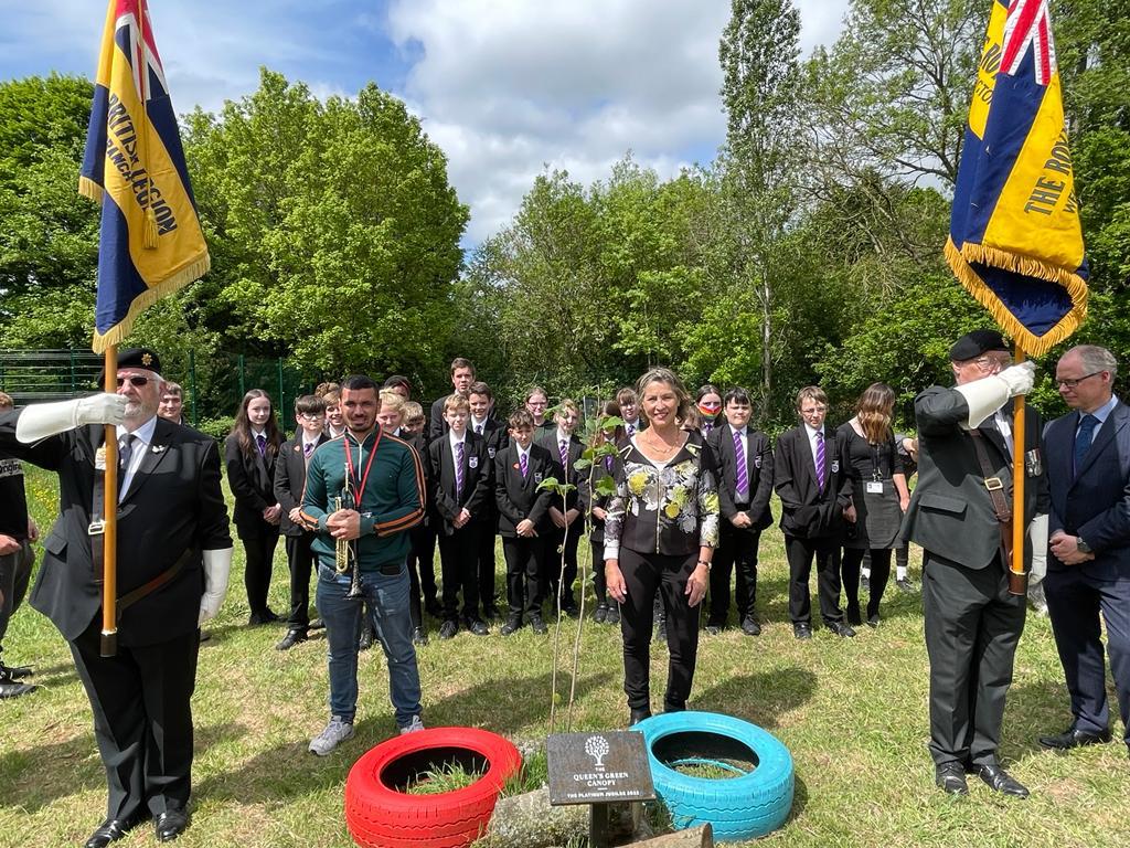 pow_rebecca's tweet photo. What a wonderful Forest School at @TauntonAcademy! And I was proud to unveil the hazel tree planted for the @QueensCanopy with @PoppyLegion #CommonwealthCanopy #TauntonDeane https://t.co/CG2cPZaVXa