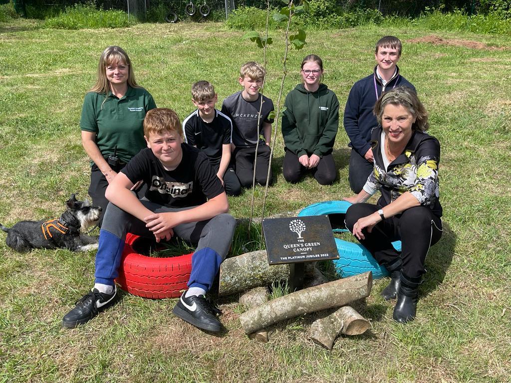 pow_rebecca's tweet photo. What a wonderful Forest School at @TauntonAcademy! And I was proud to unveil the hazel tree planted for the @QueensCanopy with @PoppyLegion #CommonwealthCanopy #TauntonDeane https://t.co/CG2cPZaVXa