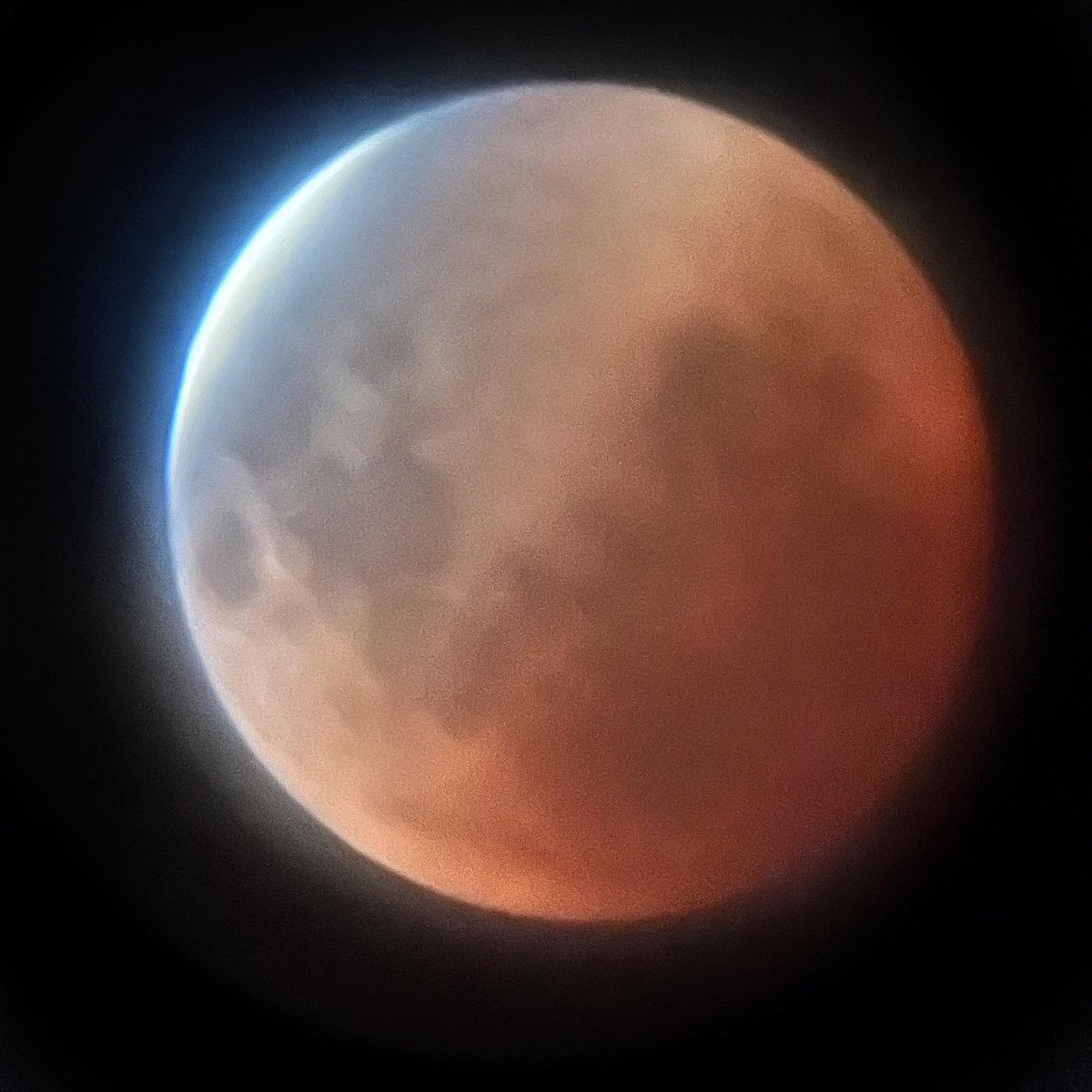 Meldenius's tweet photo. Not terrible given my old equipment and the fact that I had to hold the iPhone up to the lens. Lovely to watch, though. #lunareclipse https://t.co/iZiFBmOsfx