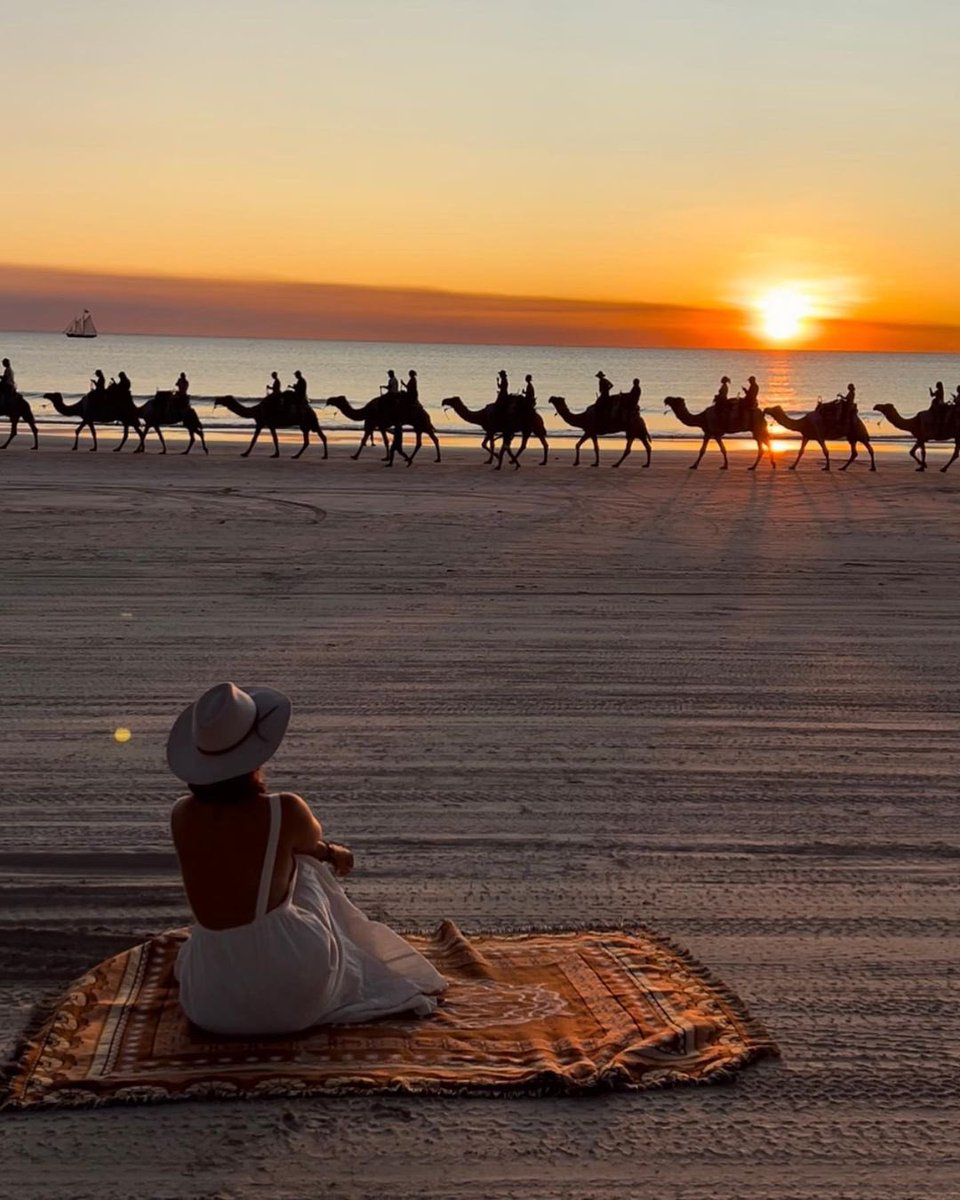 WestAustralia's tweet photo. Did you really go to @VisitBroome if you didn’t snap a photo of the famous camel train at sunset? Discover the beauty of the #Kimberleys golden hour at the world-famous #CableBeach in @austnorthwest. #WanderOutYonder #SeeAustralia 
📷 onepennybackpacker/IG https://t.co/S2w6Ex31hL