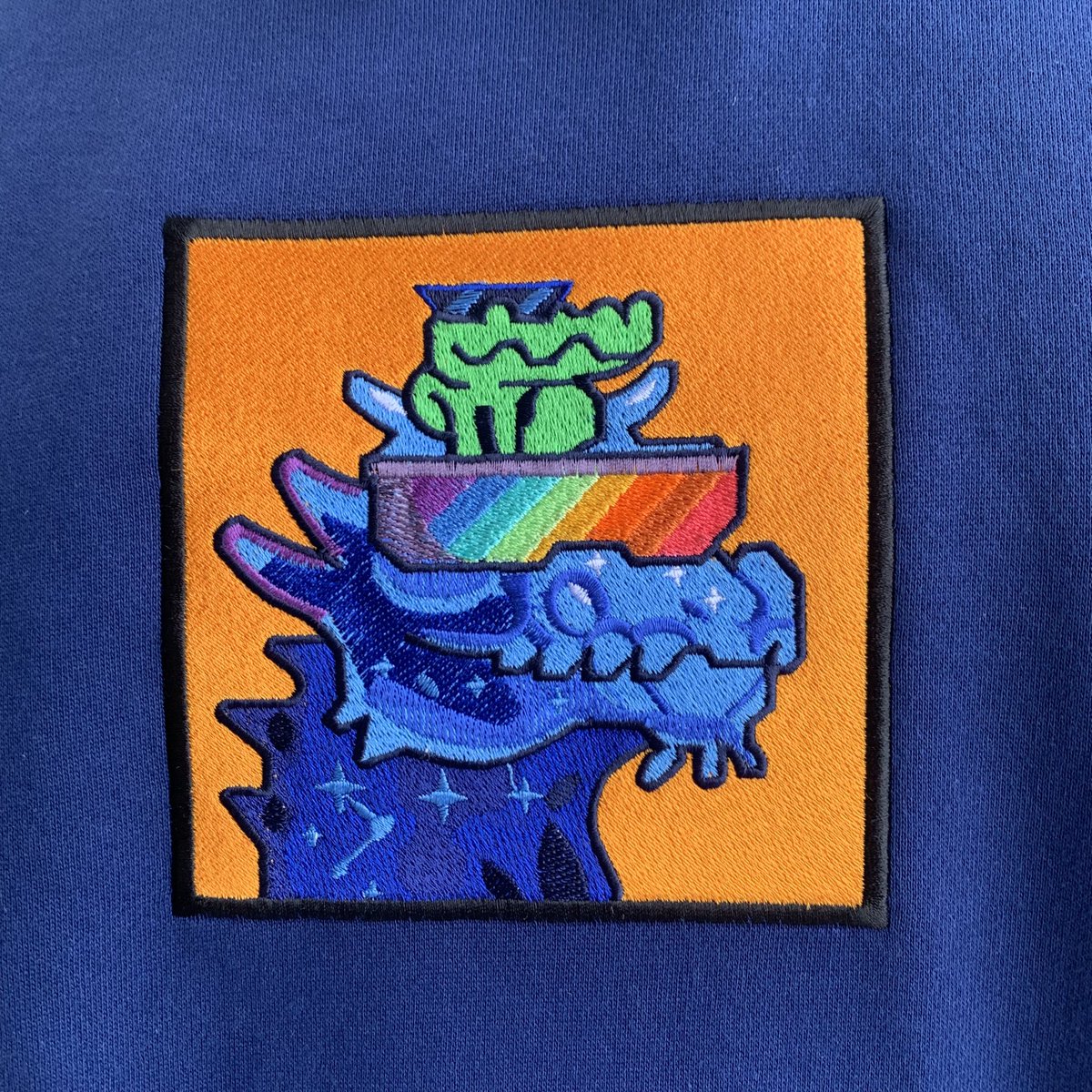 SaintCapital88's tweet photo. I just recieved the best gift from my girlfriend, @beebumblebeenft. 🧡

Thanks @embroidery_boy for the quality hoodie, now I can rock my @BoryokuDragonz wherever I go 🐉 https://t.co/NYgzv0bpll