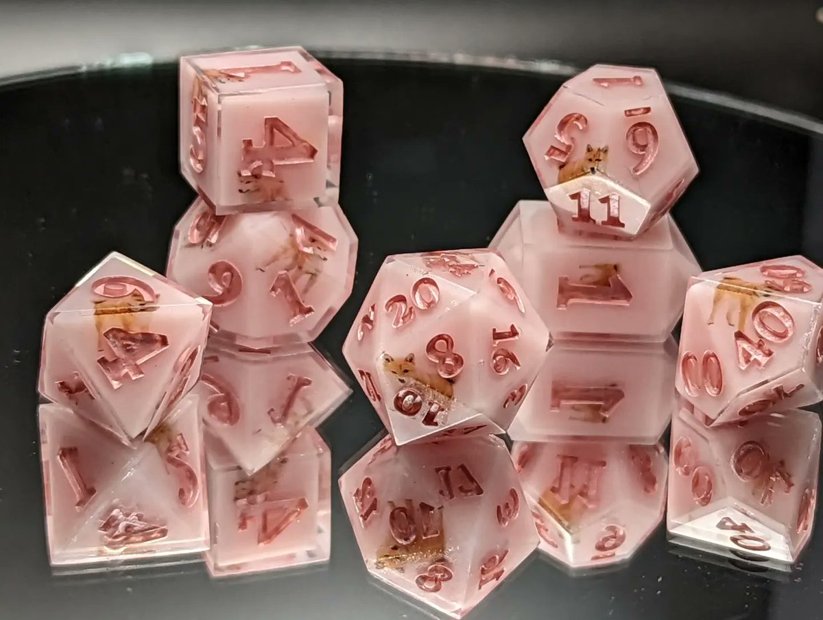 mythscapades's tweet photo. Finished pink puppy dice for my 7 yo niece! And they glow in the dark!

#DnD #ttrpg #handmadedice https://t.co/Hp7gdXFL9G