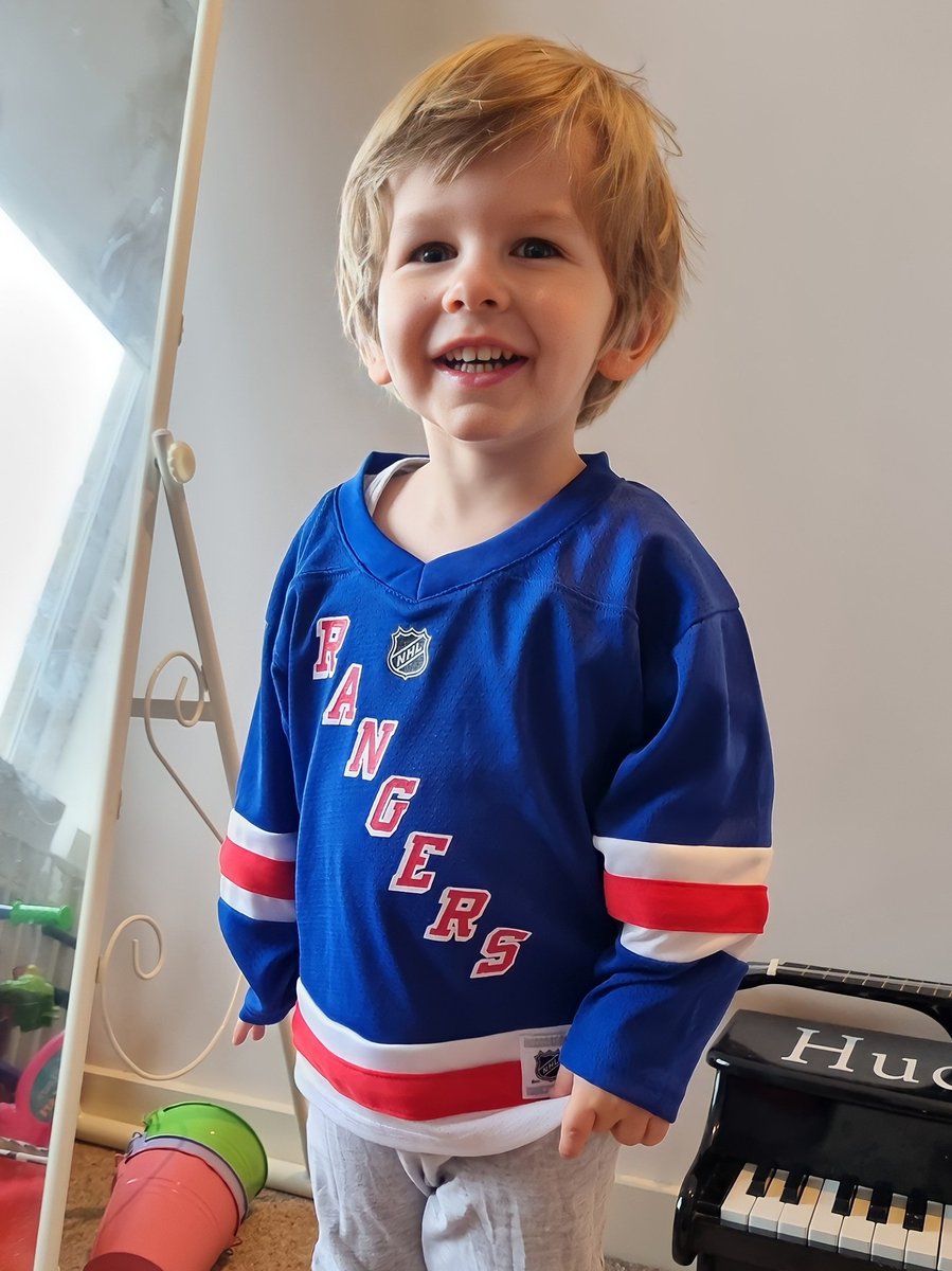 stef_little's tweet photo. My Little Ranger showing some UK support for the @nyrangers yesterday, before a huge Game 7 Play-Off win overnight!! Bring on the next round!! 🏒🔵🔴⚪️ #NYR #LGR #NoQuitInNY https://t.co/TnKsuzfU8M