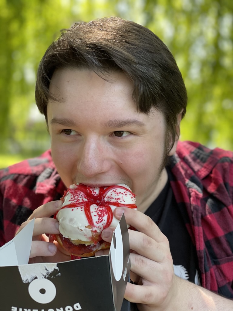 softwarebear's tweet image. my boyfriend (as of this past weekend) ... eating traditional bear food ... I guess it could be a marmalade donut ... but I&apos;ll settle for raspberry ... goes with his shirt too ... I love you Scott