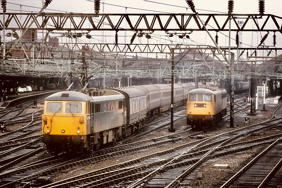 Another one from Crewe I’m a full sun type of guy but unfortunately it was dull rainy day I ventured out of station for a good soaking and about two pictures before I gave up ,87010 put through the coolscan maybe I should turn it to B&W ?  #class87 #trainsspotting #crewe #BRblue