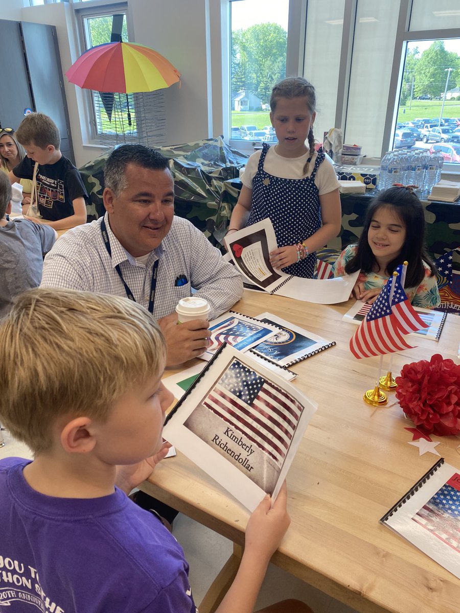 Students sharing a veteran’s story through their books. ⁦<a href="/WestCler/">West Clermont Schools</a>⁩