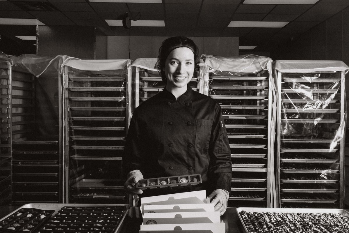 JACEKChocolate's tweet photo. Meet Kassandra! 👋 Kassandra is part of the packaging team, and spends her days filling custom box orders, building products to be added to inventory, and making sure your order is ready to be shipped or picked up. #staffshowcase #couturecollection https://t.co/GJEoaDnHX6