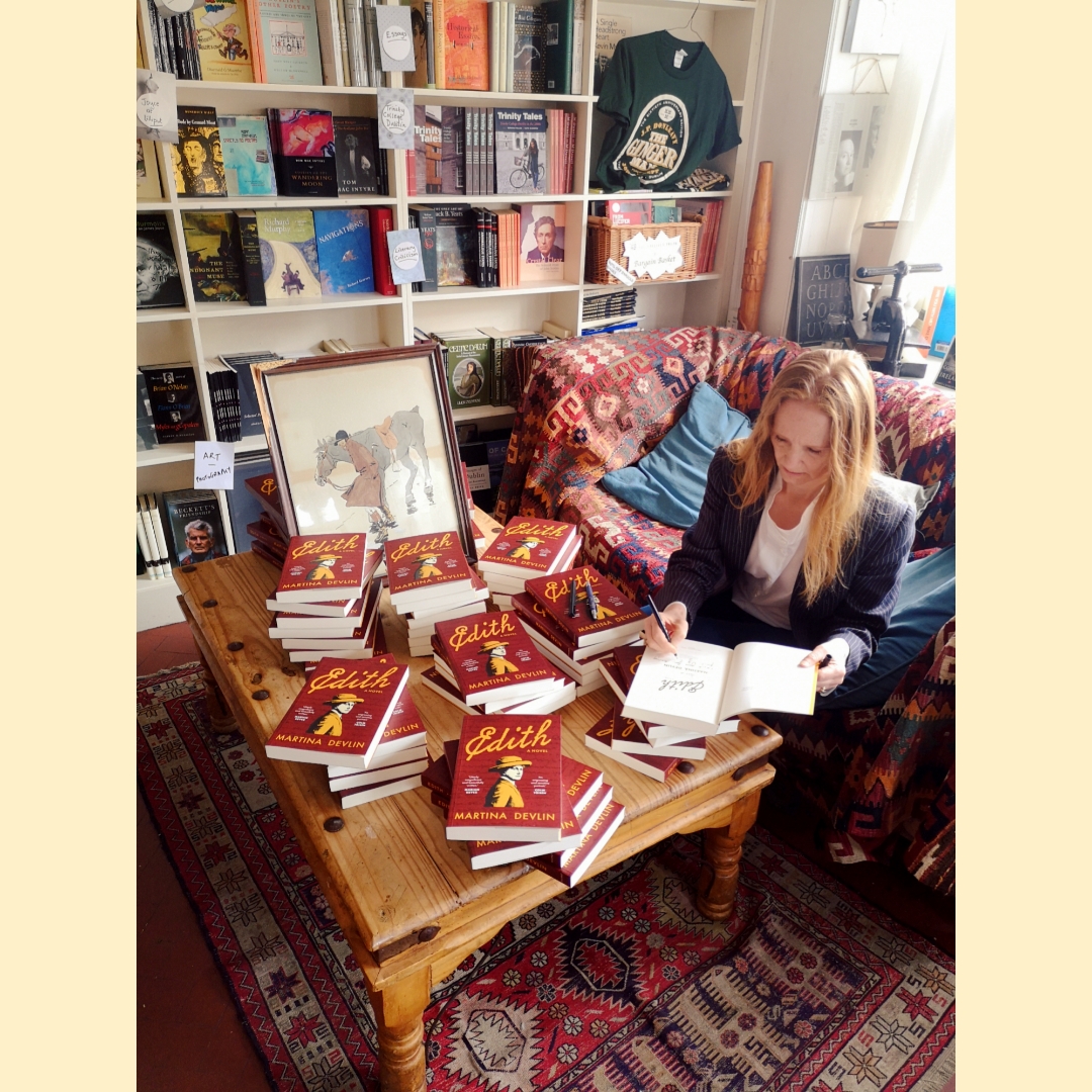 LilliputPress's tweet photo. ✨SIGNED COPIES✨
@DevlinMartina is visiting bookshops to sign copies of her new novel Edith. Here she is signing books in our office, alongside original artwork by Somerville. Followed by a quick venture with Antony to Lilliput's rooftop which overlooks Stoneybatter! https://t.co/pAJgTFZGhU
