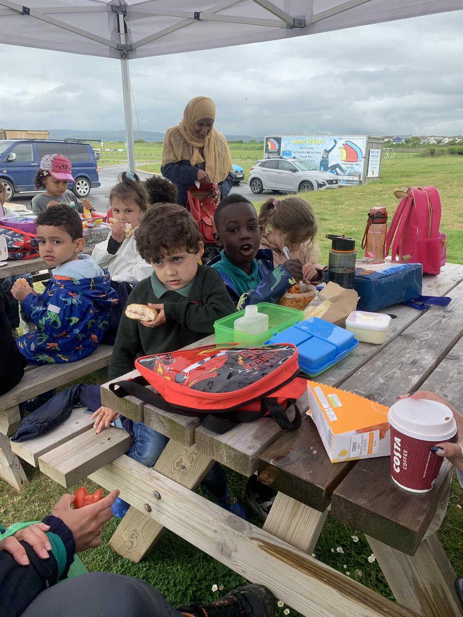 ReceptionMoon's tweet photo. It was a rainy lunchtime so we had our lunch under the gazebo in the dry! Lots of sandy wet toes and happy smiling faces 😁 https://t.co/HwPhoSX1UE