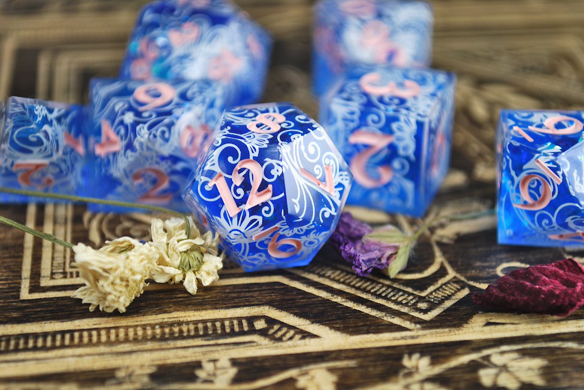 2crit2quit's tweet photo. ~💠🌸☁️~ 
I just want people to go “ohh!” when they see my dice, that’s all. Just dice that are ohh! worthy 
#dice #dnd #handmadedice https://t.co/FnERw9QaOA