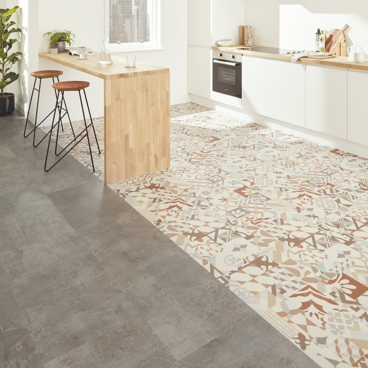 FCWMagazine's tweet photo. A new week means a new #DesignMonday! Tile and stone looks have taken the resilient category by storm. This kitchen floor includes two stylish visuals from Karndean's Opus glue-down range: a geometric patchwork and limestone look. [📸:  @KarndeanFloors  ] https://t.co/2niI9Exjf7
