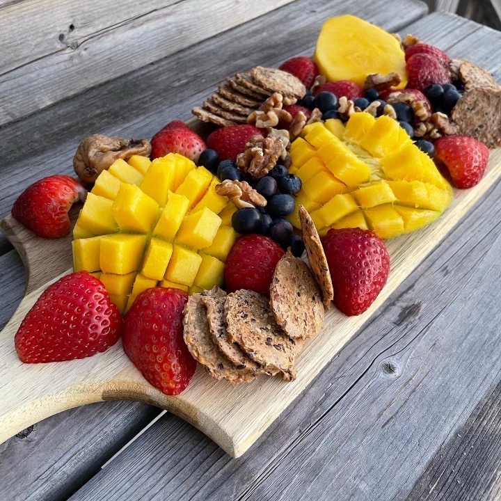 An easy way to get in your vibrant fruits into your day! Make a fruit-based #charcuterieboard. Children love it too. The more colourful, the better. #HealthyEating #HealthTips #EatTheRainbow