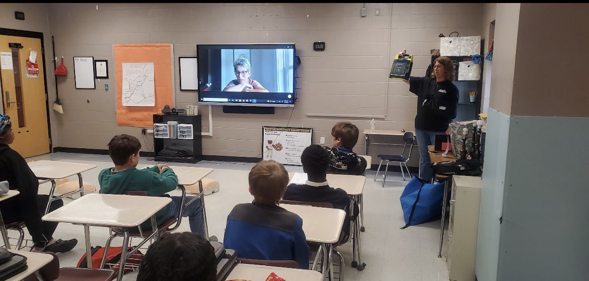 TRMSSTEM's tweet photo. All 8th grade students at TRMS received hands-only CPR and AED training through a collaboration between Coordinated School Health, school nurse Alana Vandiver, and Angel Carter of Project Adam! @RosenwaldBears #STEM #CTE #STEMclusion #STEM4All #TrentonRosenwald https://t.co/jwvgmr63z1