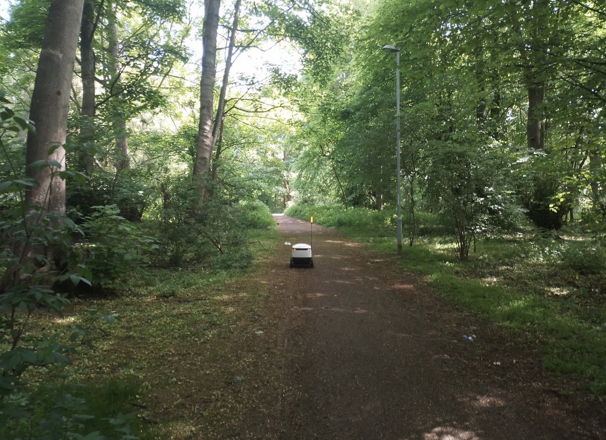 bjessim's tweet photo. On my bike ride this morning, saw a delivery robot lost in the woods https://t.co/uxWoqvTYwP
