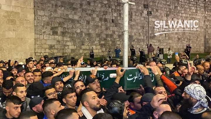 firstqiblah's tweet photo. Shaheed of Al-Aqsa, Walid al-Sharif who passed away Saturday from his wounds incurred from Israeli firing at al-Aqsa in Ramadan, had his Janazah Salaah performed at al-Aqsa this evening, after which thousands carried his body to the Al-Mujahideen cemetery in Al-Quds. https://t.co/7n9SKQ5tip