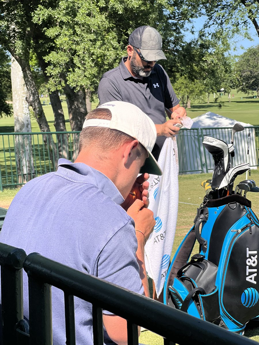While between Michael Greller and Bones on the range, Adri Arnaus’caddie lights a hand-rolled heater. Legendary move.