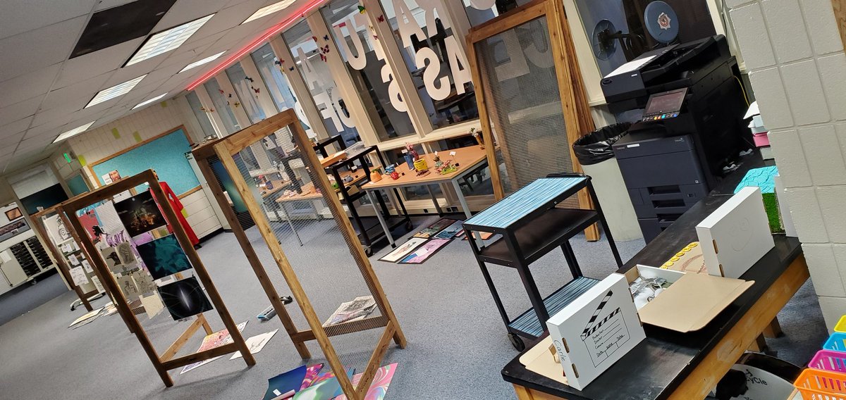 PamVerfaillie's tweet photo. Starting to set up for the Spring Art Show in the VHS library. Always awesome to see student creativity! #WhyILibrary @AlaskaAsl #AkLearns https://t.co/UIYcEisV49