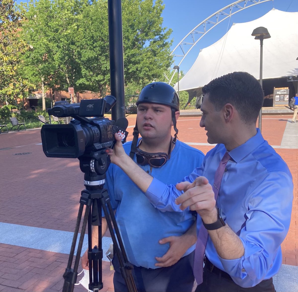 AM_Baxter's tweet photo. Pete & new buddy NBC29’s Max Marcilla review the finer points of TV journalism on the Downtown Mall. Pete’s requested priority birthday present is “a camera like yours.” Thanks for being so kind & generous with your time Max! #thumbsup #inclusion #BeLikeMax @MaxJMarcilla https://t.co/8s6hrhx6aw