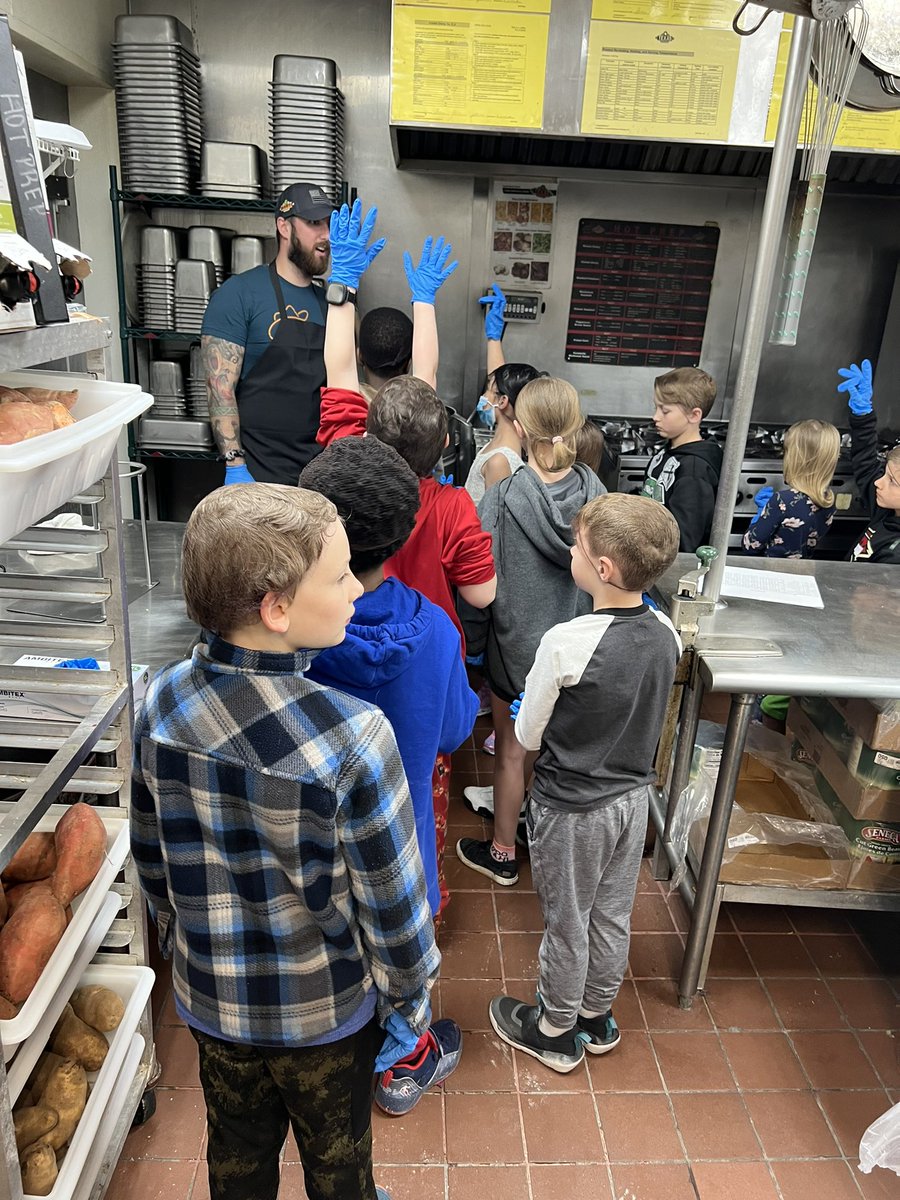 TeachWithMsT's tweet photo. So fun to take a field trip to Texas Roadhouse to see the “behind the scenes” at running a business! We even learned how to do the Boot Scootin’ Boogie and made our own fresh baked bread!😋 Thanks, Texas Roadhouse Grand Forks! #TrailblazeOn #GFSchools https://t.co/M2ORXHaRYP