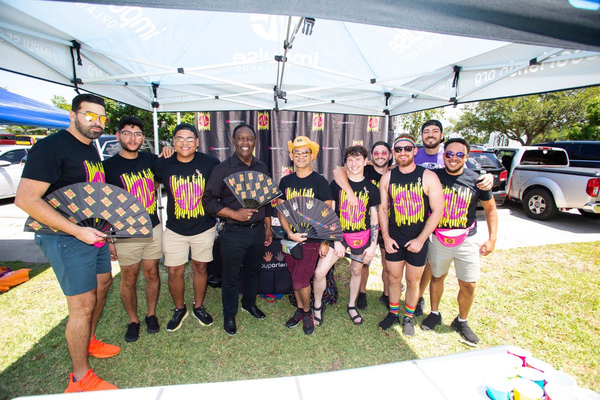 ImpulseOrlando's tweet photo. What a beautiful first Apopka Pride hosted by Hope CommUnity Center! Enjoyed our ‘attempt’ at teaching Mayor Jerry Demings how to clack a fan. 

❤️🧡💛💚💙

And most importantly distributing 34 vaccinations during our current meningitis outbreak. https://t.co/aZdXs1MHmN