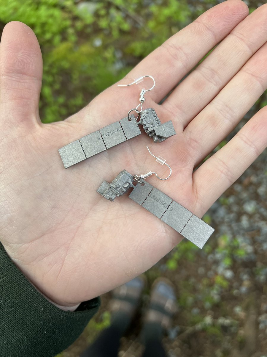 Kayla_Hubbard's tweet photo. Spent way too long looking for satellite earrings on Etsy… couldn’t find any, so with a little help, I made my own! 3D-printed, titanium Landsat-9 (@NASA_Landsat) earrings made using a model from @NASA! 🛰 https://t.co/eWupnF4uOK