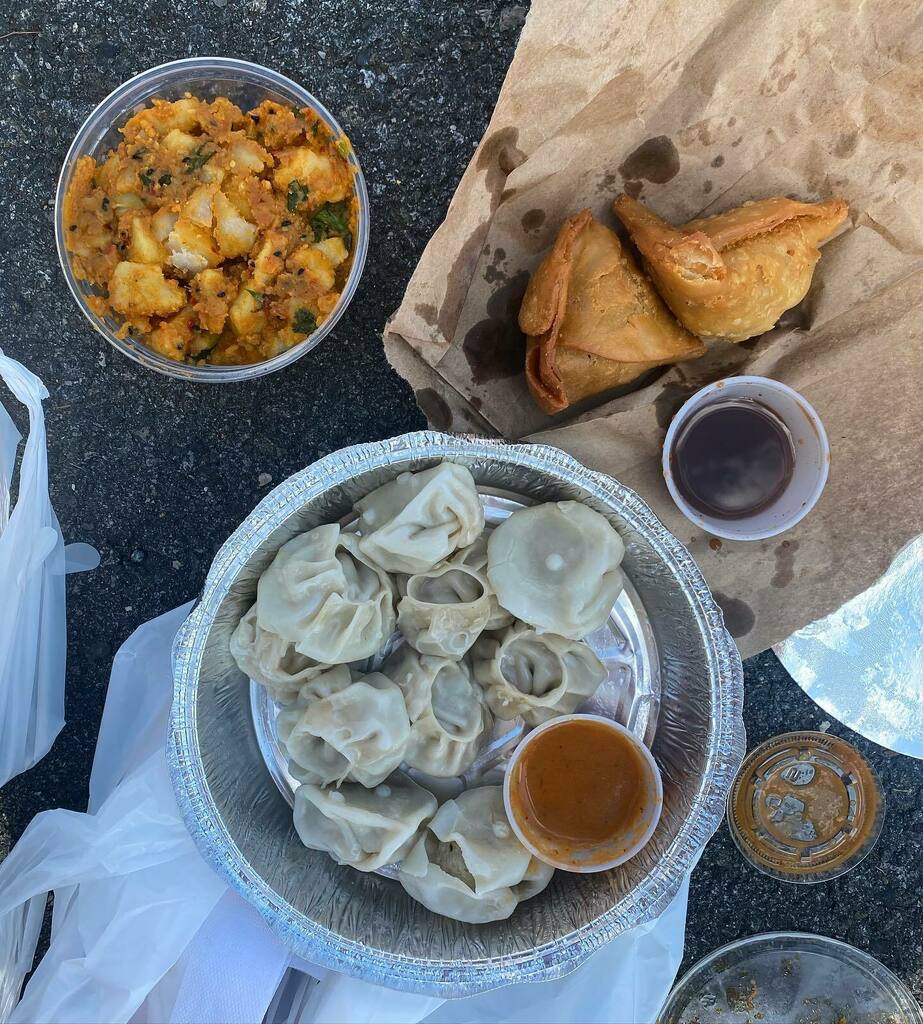 Found a little spot in the shade to enjoy this while at @asianfestivalonmain! Insane turnout and community support yesterday 💛 Loved seeing it and it was worth an unexpected sunburn // Alu dum (potatoes with tomato, ginger, garlic, and spices), chicken momos, and samosas fro…