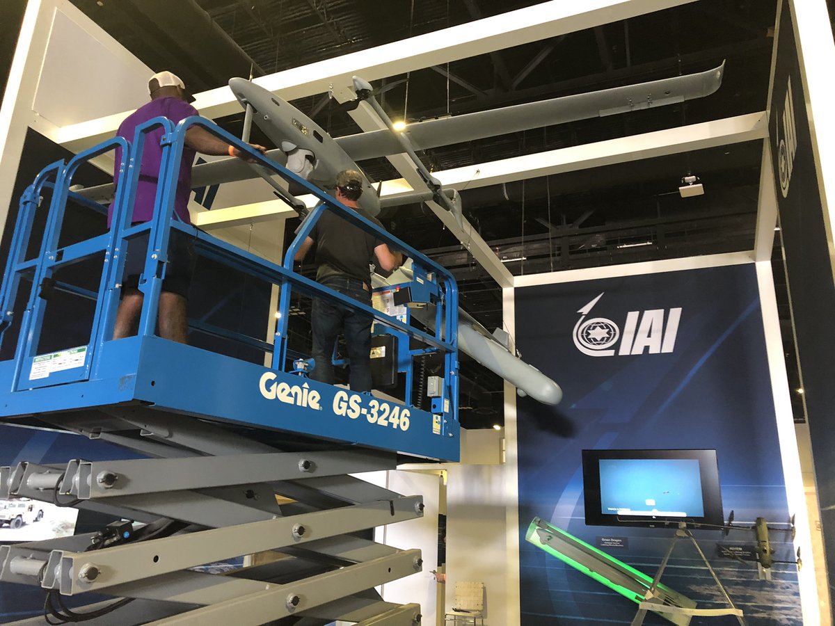 iai_usa's tweet photo. @nthdegreeinc at #SOFIC - hanging models is hard work but they got it done! Visit us at booth 1826! https://t.co/dUYD7bpCf8
