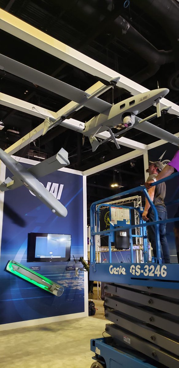 iai_usa's tweet photo. @nthdegreeinc at #SOFIC - hanging models is hard work but they got it done! Visit us at booth 1826! https://t.co/dUYD7bpCf8