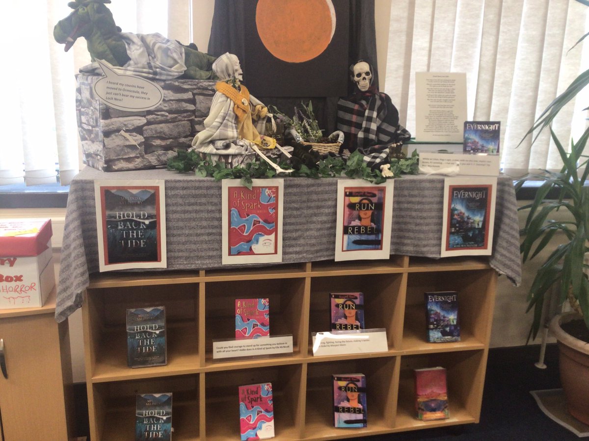 BonessAcadLib's tweet photo. It’s RED mania! Bob and Sam are in character from Hold Back the Tide, cousin Nessie has come to visit. Jeff has gotten hold of the sequel to Evernight before me 😤 Fabulous visit from Ross MacKenzie today, very inspiring. @BAEnglish6 @Boness_Academy @Falkirk_LRS #Red16 https://t.co/VOm5EOnGnT