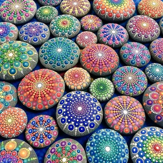 womensart1's tweet photo. Elspeth McLean is an award winning artist whose love of colour has evolved into a unique style of painting she describes as, “Dotillism” on her 'Mandala Stones' #WomensArt https://t.co/VoB8CcucmP