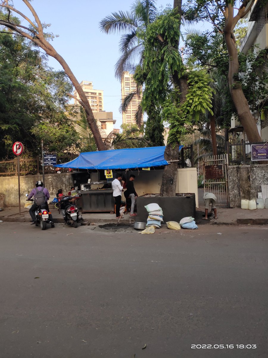 Attn @mybmcwardGN...
You havent been able to remove this #illegalHawker on the footpath opp Tendulkar Hall on Chatrapati Shivaji Maharaj Marg, Mahim &amp; now is building a huge cement concrete base around the tree  as seating for his clients.
Kindly take action..
<a href="/DighavkarKiran/">KIRAN DIGHAVKAR</a>