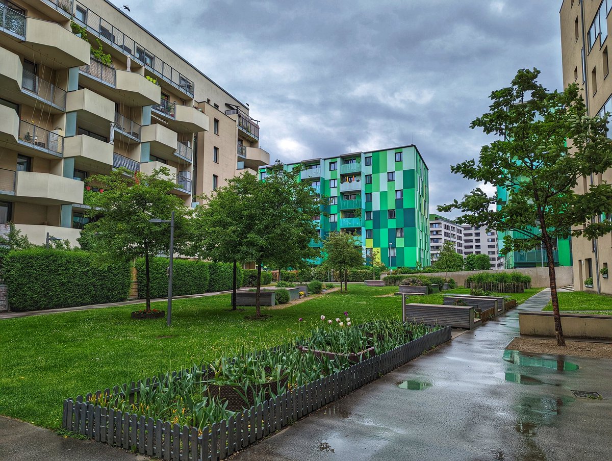 mikejcw's tweet photo. Visiting #Passivhaus transit oriented development "Eurogate" on @OntarioHBA International Housing Tour in #Vienna. High performance housing with extremely airtight building envelopes, district heating, solar shading &amp; metro station. #OHBAtour https://t.co/HJRjFJBYFW
