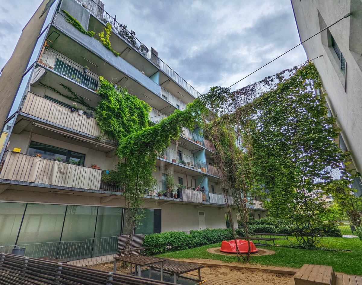 mikejcw's tweet photo. Visiting #Passivhaus transit oriented development "Eurogate" on @OntarioHBA International Housing Tour in #Vienna. High performance housing with extremely airtight building envelopes, district heating, solar shading &amp; metro station. #OHBAtour https://t.co/HJRjFJBYFW