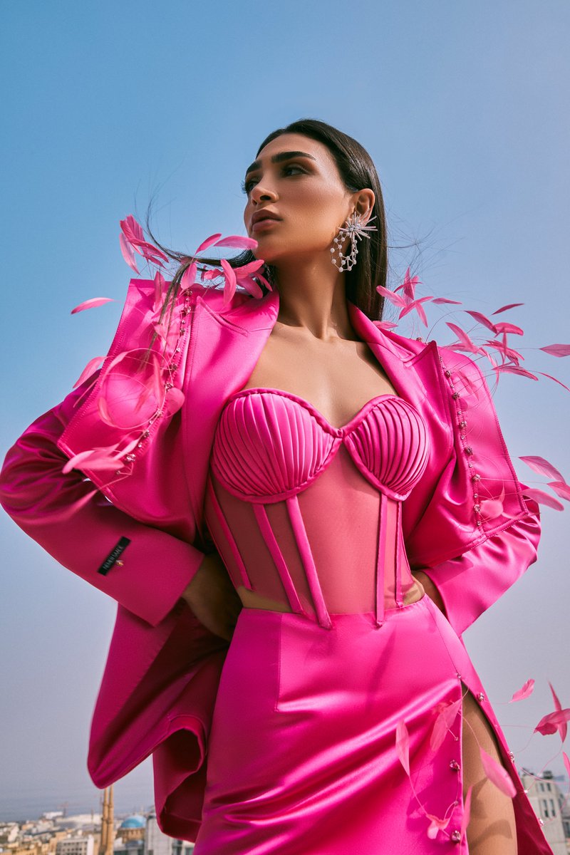 NemerSaadeWorld's tweet photo. "Narcisista" the hot pink ensemble featuring a hand-crafted corset and a blazer with Swarovski crystal gems and pink feathers. 

Color Storm | Nemer Saade SS 2022

#NemerSaade #NSss2022 #NSforHer #NemerSaadeForHer #HotPink #SuitsForWomen https://t.co/EjzGnhFpUh